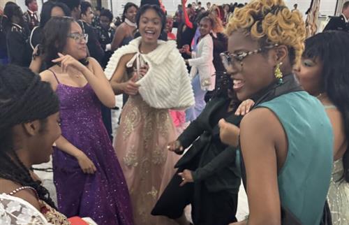 JROTC students dancing and laughing